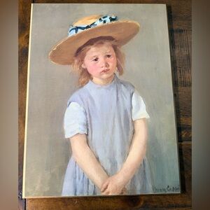 Child in a Straw Hat by Mary Cassatt.